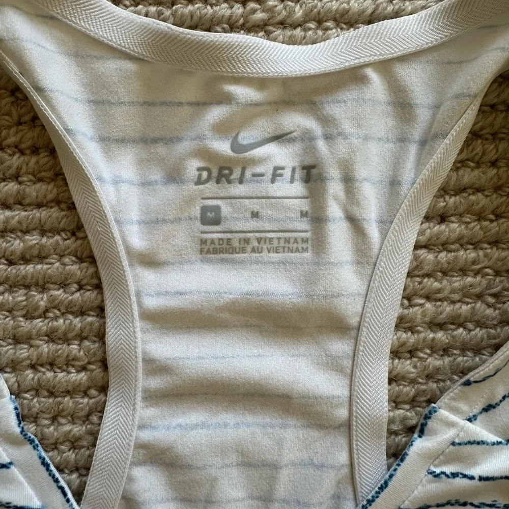 Nike Dri-Fit v-neck racerback athletic tank top white with blue stripes.
